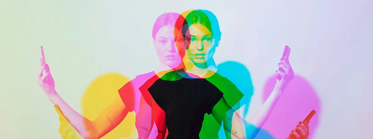 Colourful picture of a person holding a phone