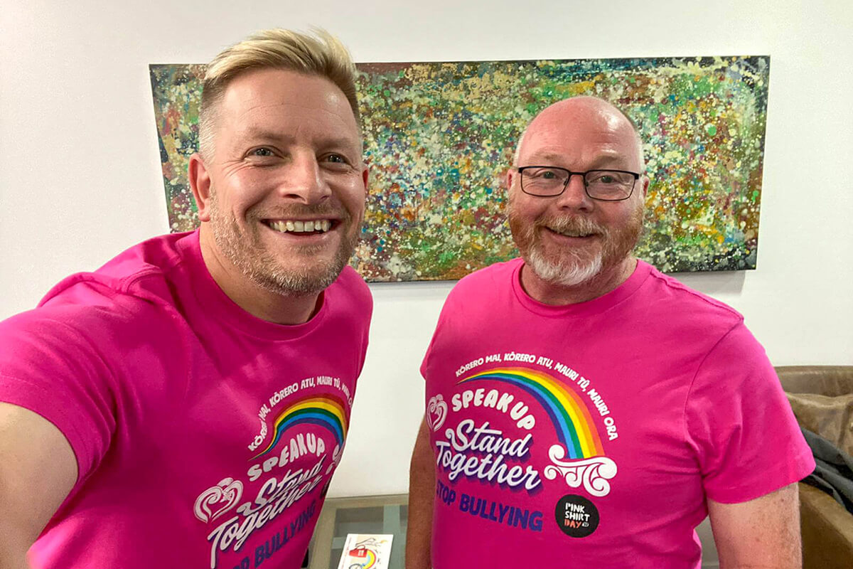 Tom and Ian, directors of Dot Two Dot, wearing pink 'Stand Together' anti-bullying campaign t-shirts
